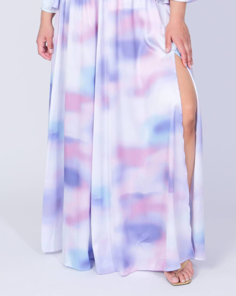 Front of a model wearing a size L Ashford Simpson Maxi Swing Skirt in Blue Watercolor by LuvMeMore. | dia_product_style_image_id:266602